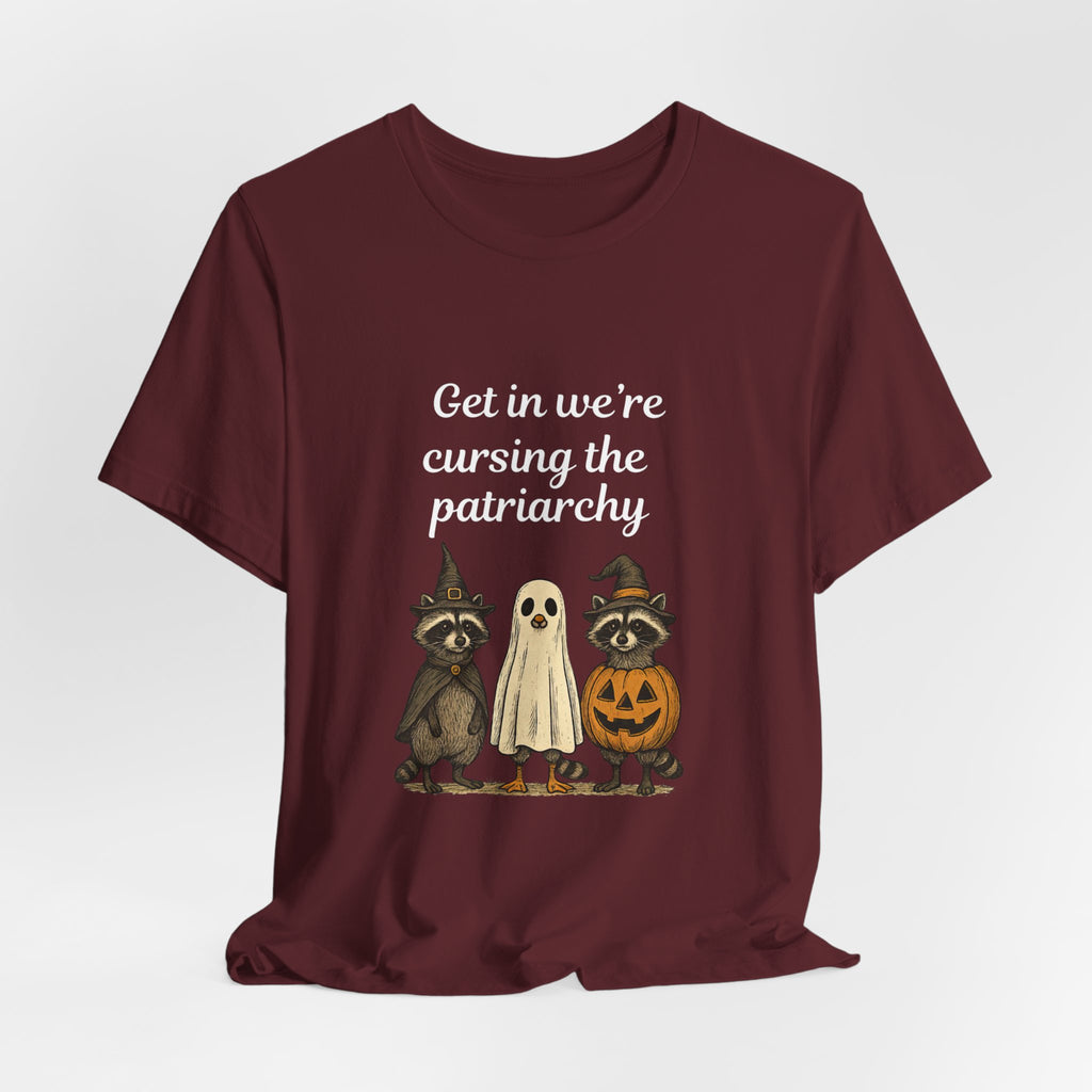 Get In We’re Cursing the Patriarchy Tee — Halloween Witch Ghost Raccoon Graphic Shirt