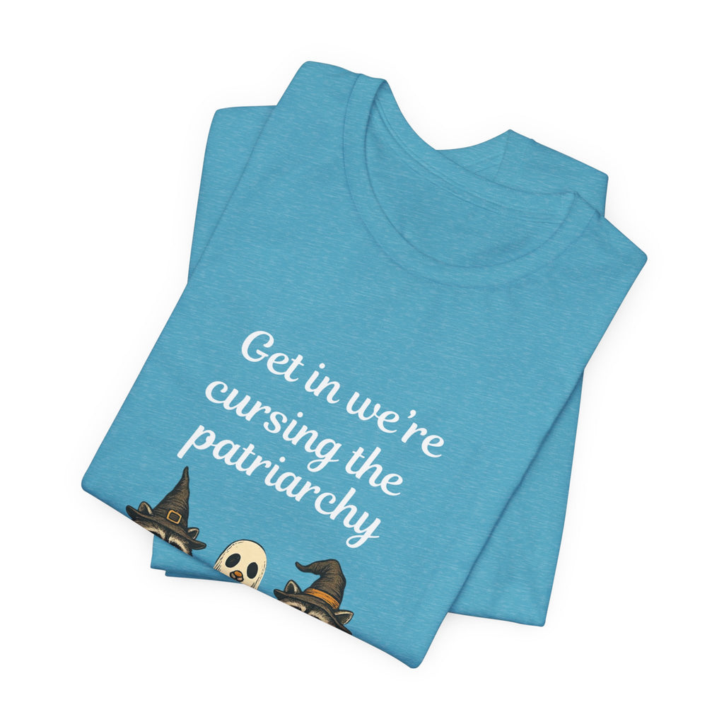 Get In We’re Cursing the Patriarchy Tee — Halloween Witch Ghost Raccoon Graphic Shirt