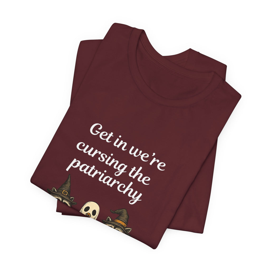 Get In We’re Cursing the Patriarchy Tee — Halloween Witch Ghost Raccoon Graphic Shirt