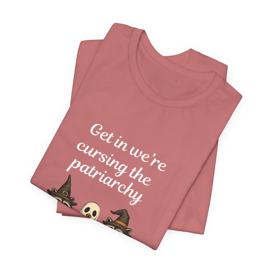 Get In We’re Cursing the Patriarchy Tee — Halloween Witch Ghost Raccoon Graphic Shirt