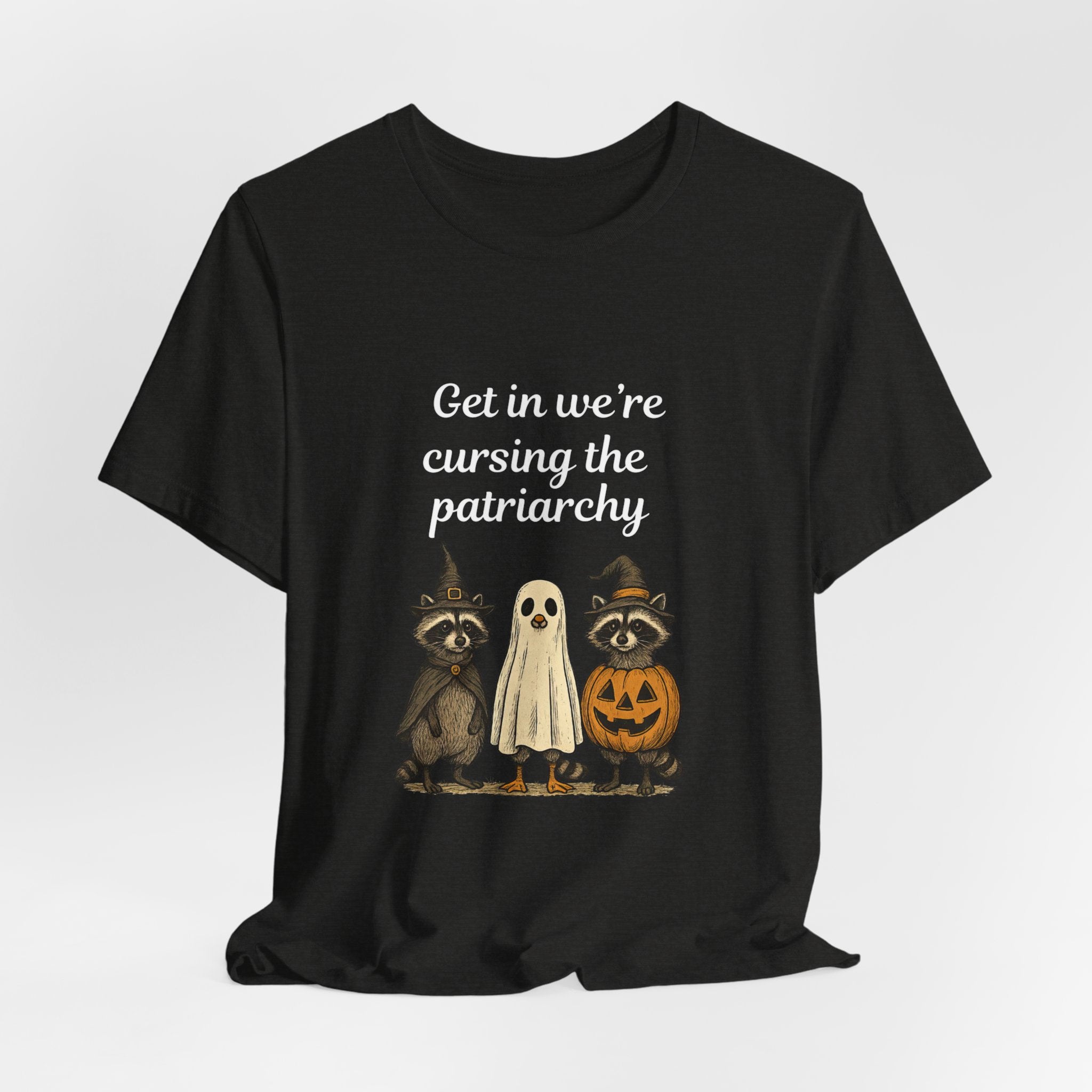 Get In We’re Cursing the Patriarchy Tee — Halloween Witch Ghost Raccoon Graphic Shirt